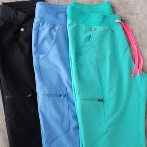 Zamora Figs scrub pants in black, blue and green